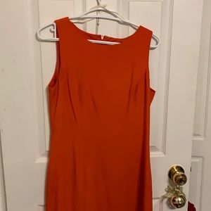 100 % silk dress, rest just above the knees. Perfect condition. Never worn.